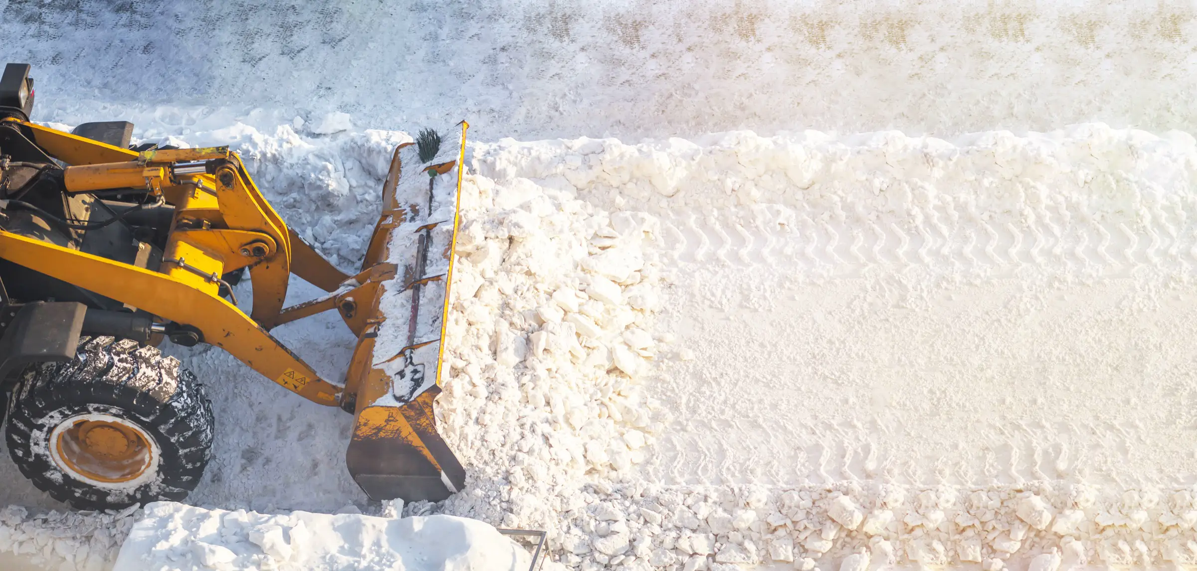 ADR Snow heavy equipment clearing snow on a commercial route